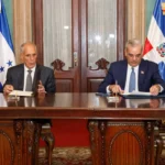El presidente de Honduras, Nasry Asfura Zablah, y durante su encuentro con el presidente Luis Abinader en el Palacio Nacional.